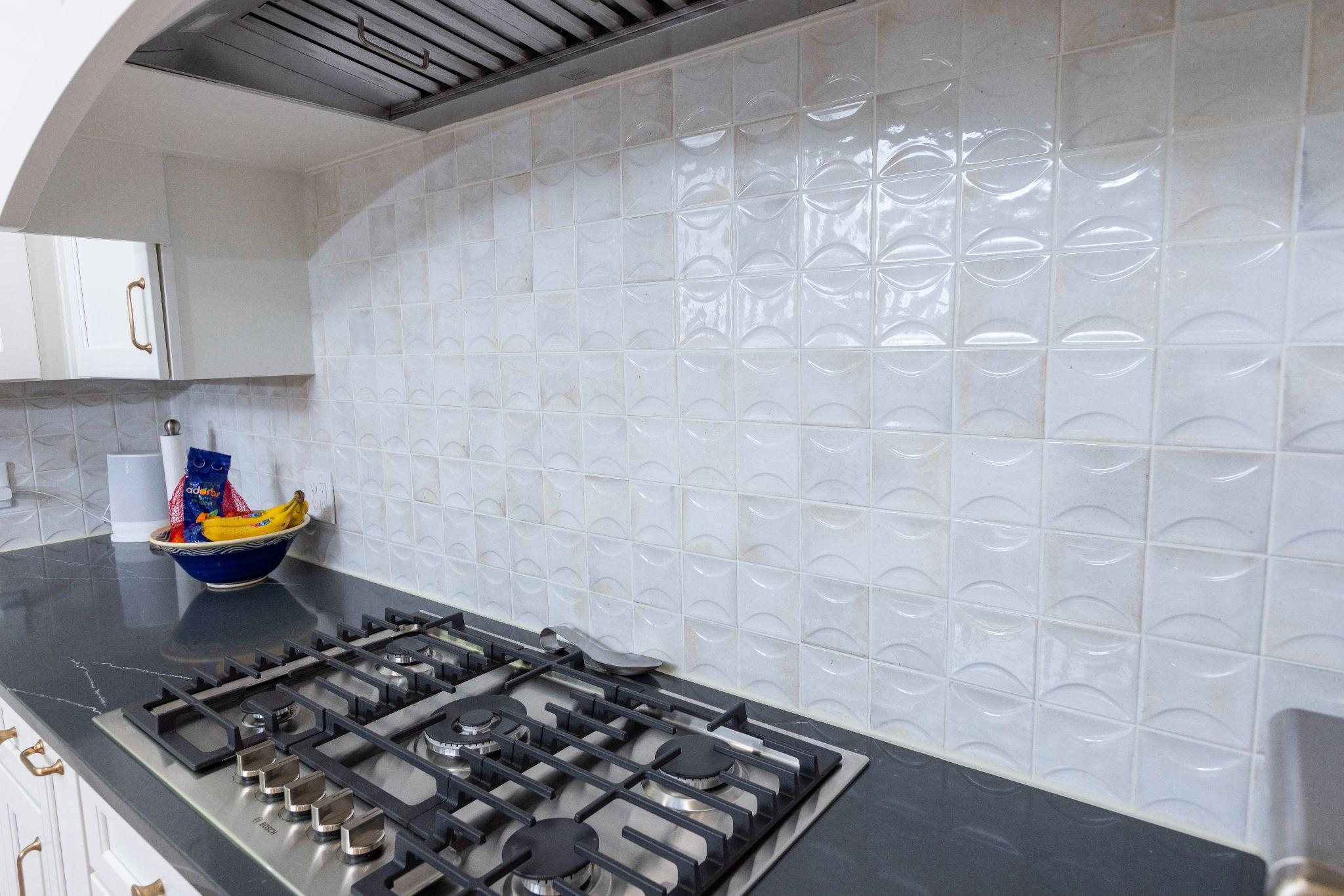 Mid - Level Backsplash Tile