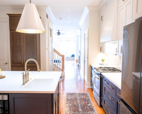 Kitchen with navy cabinets and quartz countertops